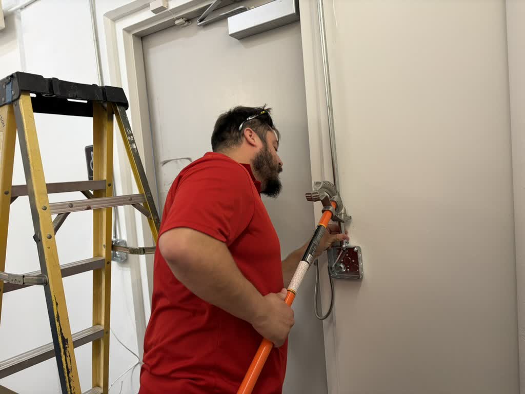 Running conduit for a door access system