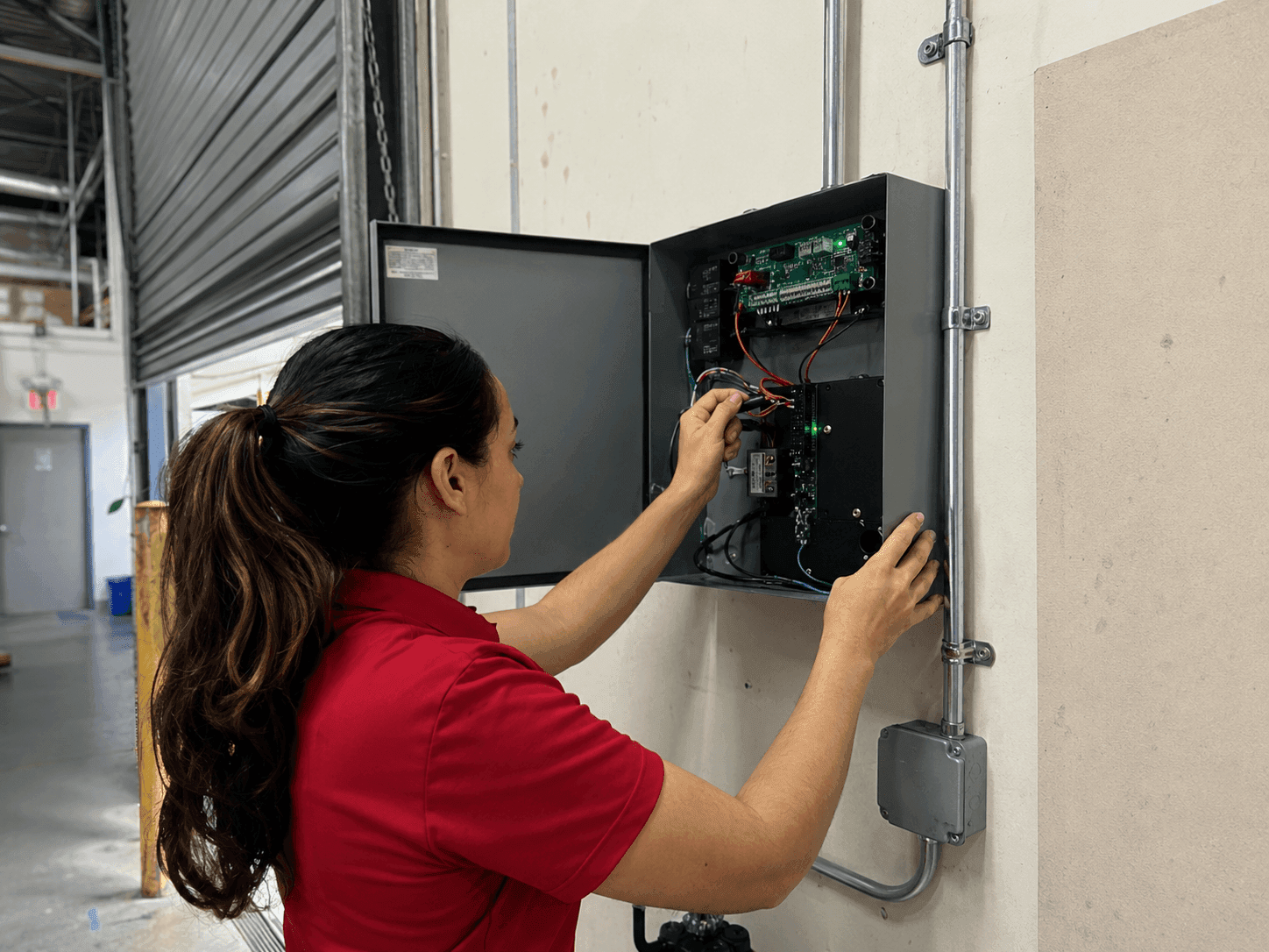 Wiring an access-control panel in a warehouse